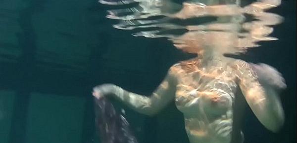 Dressed underwater beauty Bulava Lozhkova swimming naked